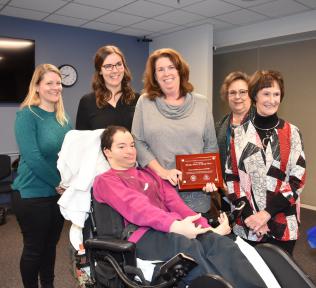 Donna Goldbranson & SPecially Adapted Resource Clubs five people receiving award