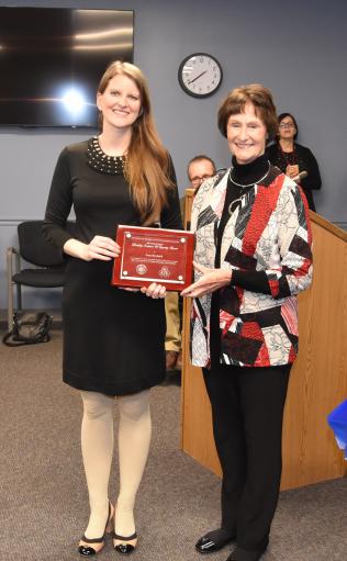 Lucy Beadnell receiving award