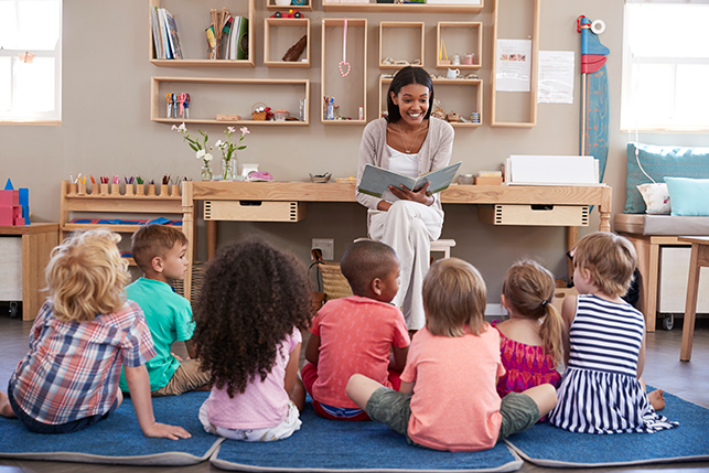 teacher reading to students