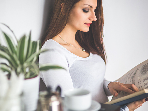 person sitting reading book