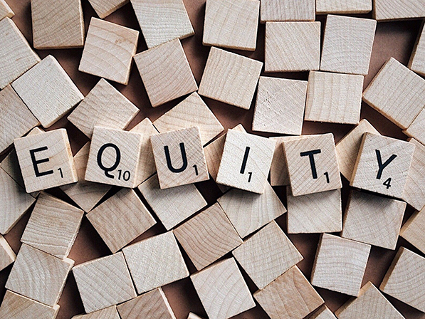 Scrabble letters spell equity