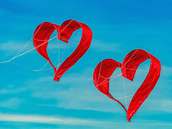 two heart kites flying