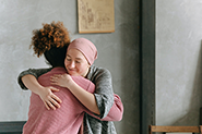 two adults hugging