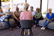 woman talking in a group setting