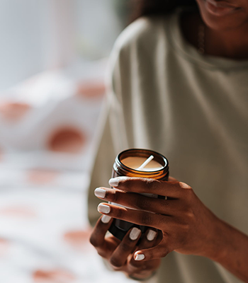 woman holding candle