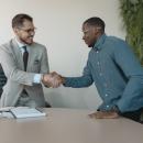 two men shaking hands