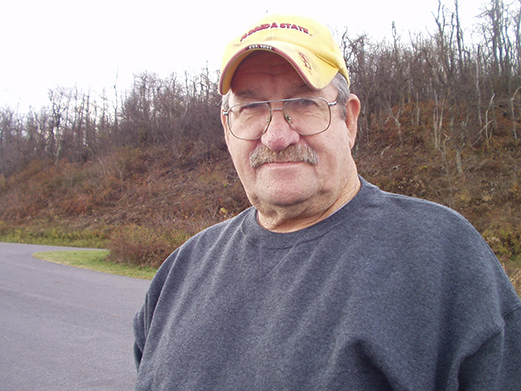 Mike Keel standing outside