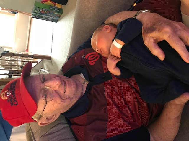 Dick Orndoff holding baby