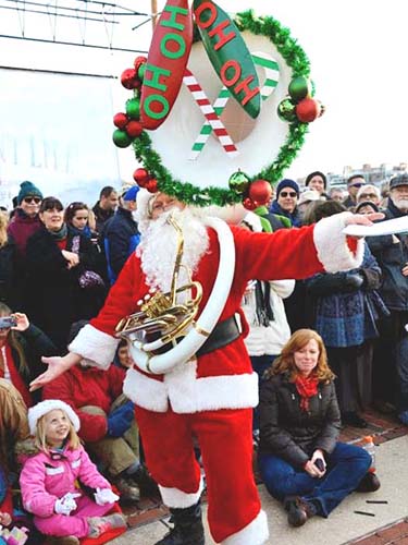 Jay Converse and tuba with holiday decoration