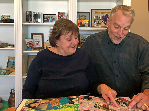 Liz Murphy and Mark Heinitz looking at photos