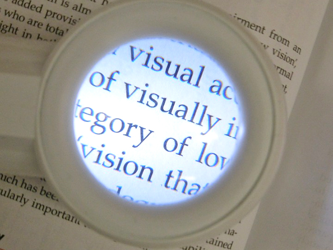 low vision magnify glass over text