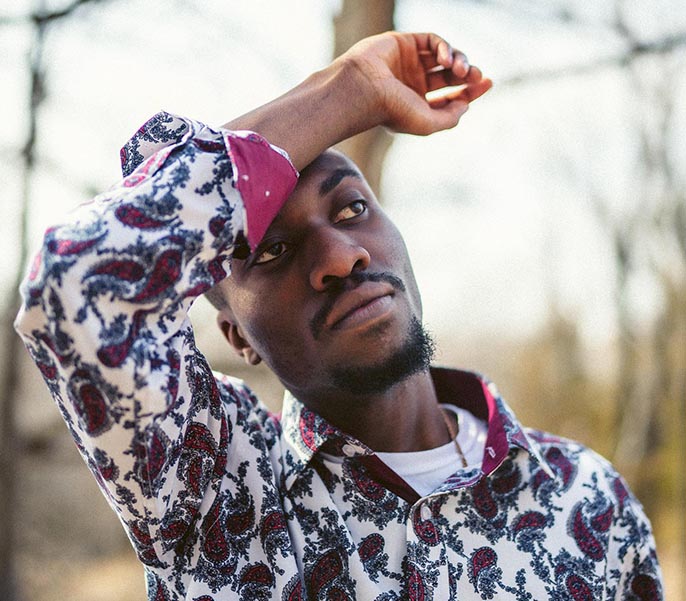 Photo of an exhausted looking young African American man