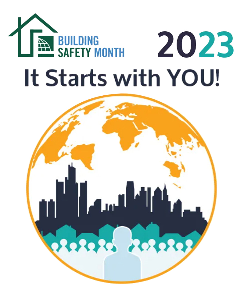 Building Safety Month logo showing a globe with a building skyline and figures superimposed over it.