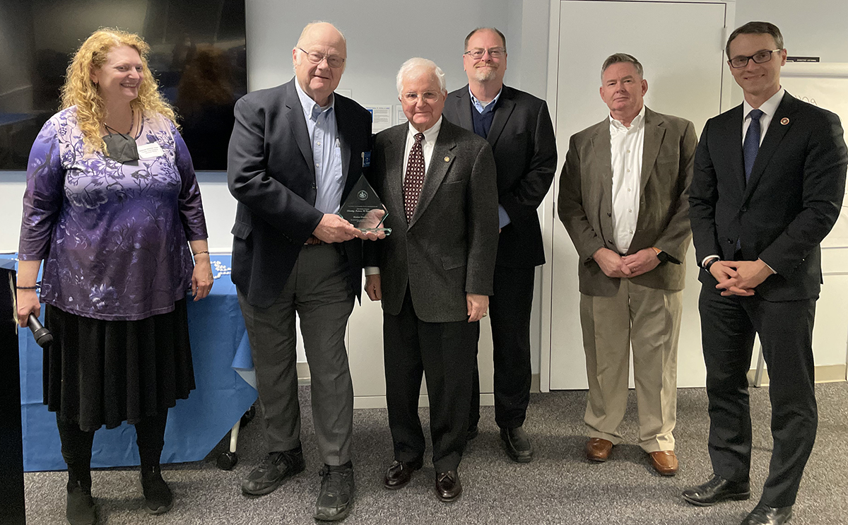 Deborah Hammer, chair, Fairfax Area-Disability Services Board, along with representatives from Marian Homes, Inc., Bill Crowder, past president, Ercole Barone, past president, Tom Savage, vice president, Paul Wilkinson, board member, and Fairfax County Supervisor James Walkinshaw (Braddock). 