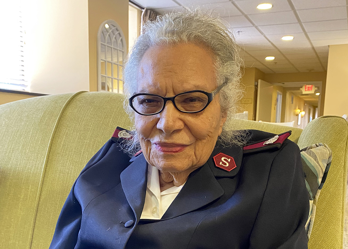 Photo of Norma Roberts smiling while wearing Salvation Army Uniform