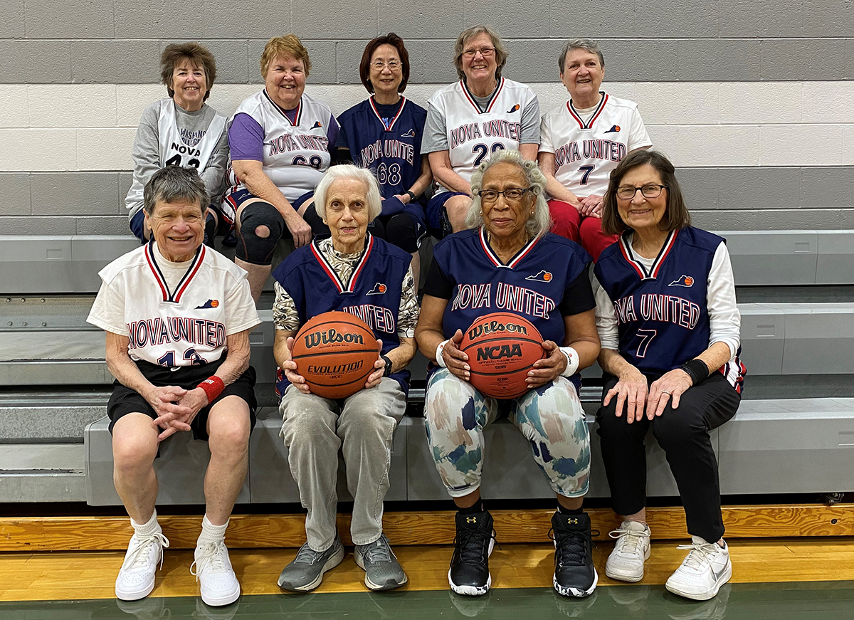 Photo of NOVA United players seated on bleachers at James Lee Community Center