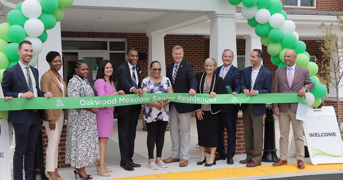 Photo of the ribbon cutting during the grand opening of Oakwood Meadow.