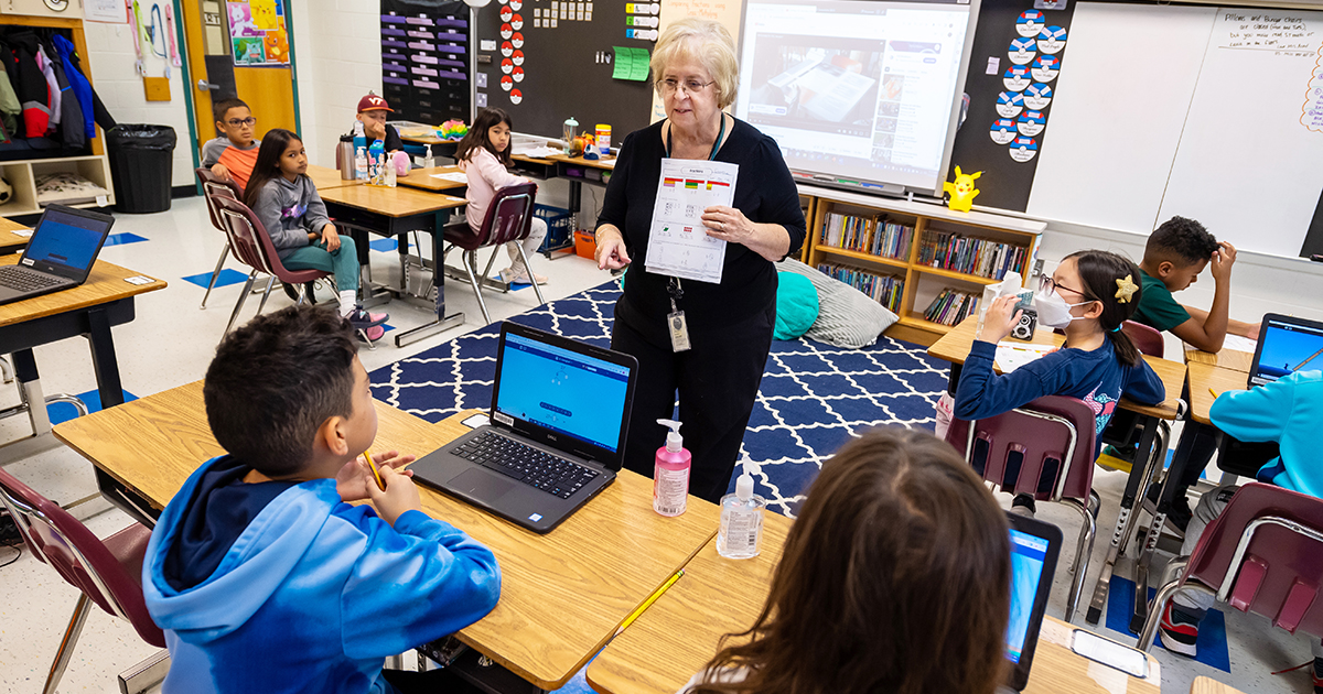 Photo of substitute teacher Bunni Cooper teaching in a classroom