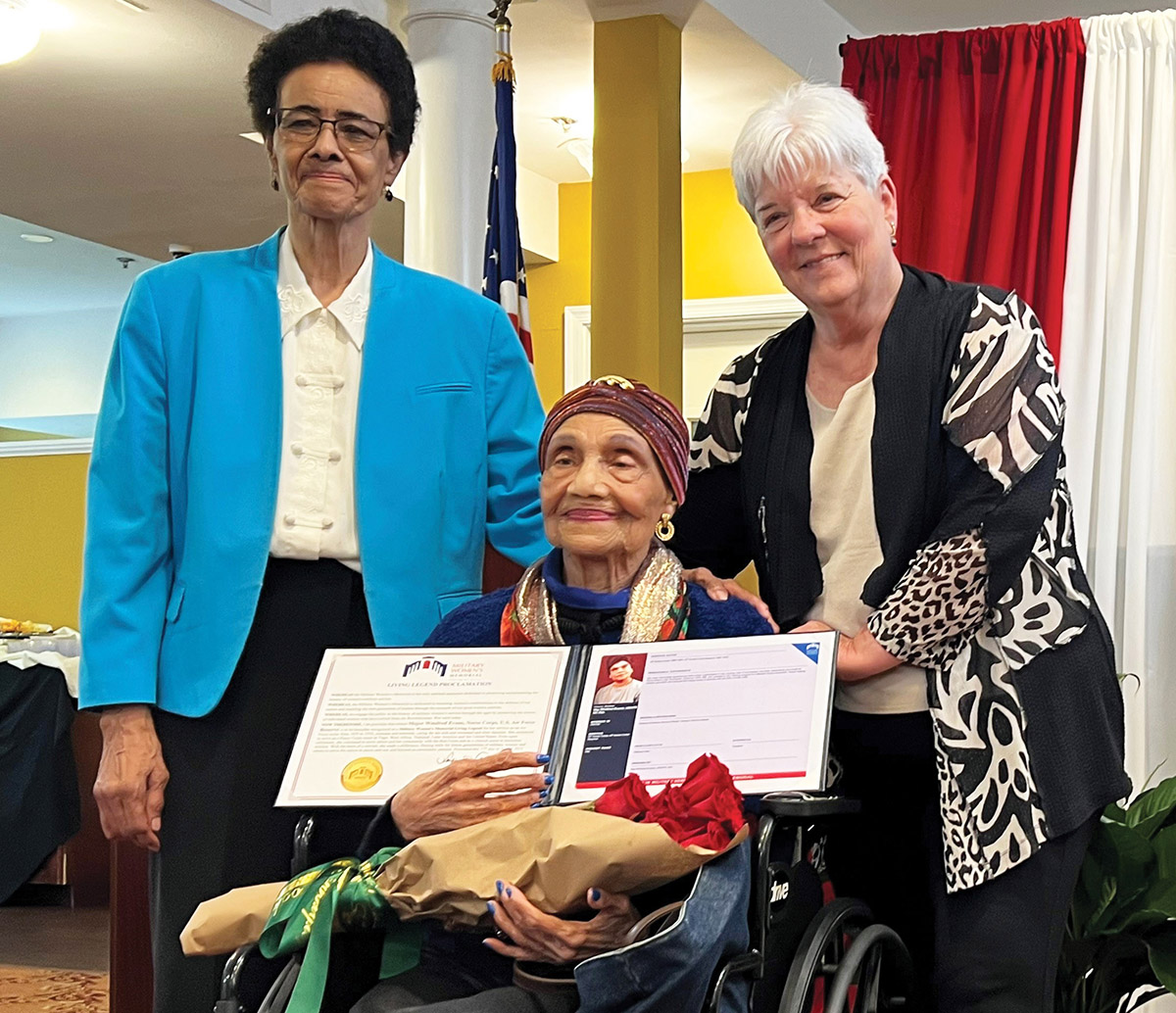 Photo of Winifred Evans receiving her Living Legend proclamation, presented by Major General Irene Trowell-Harris and Lieutenant Colonel Marilla Cushman.