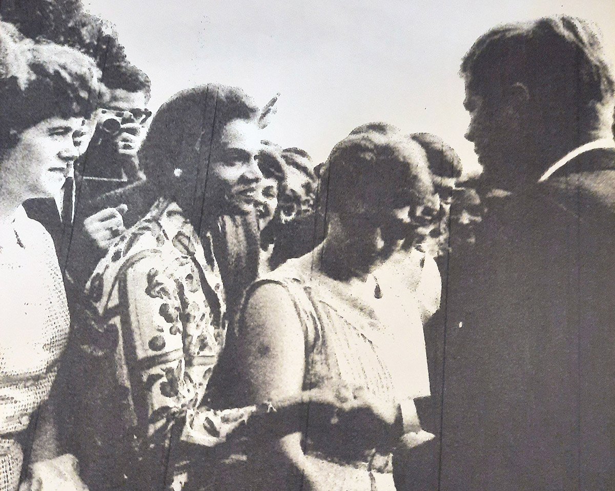 Photo of Winifred Evans shaking hands with President John F. Kennedy.