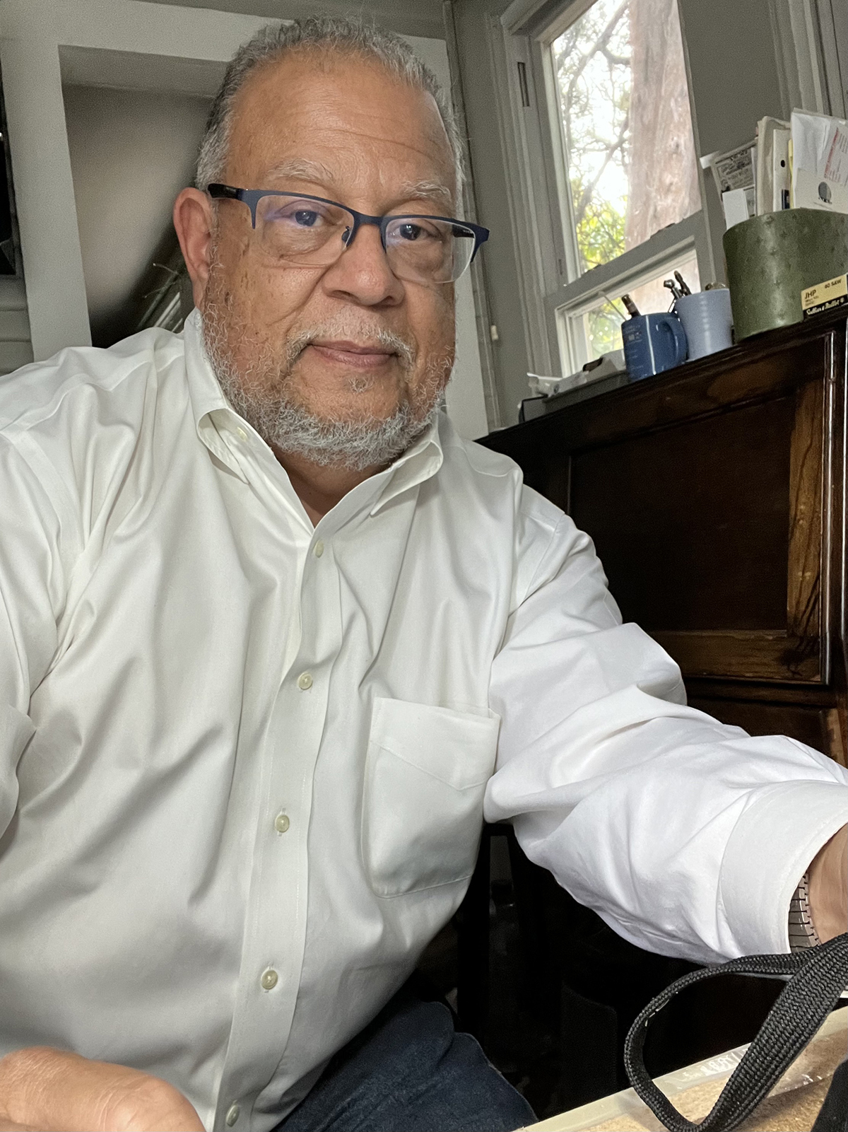 Photo of Edwin B. Henderson II in his home.