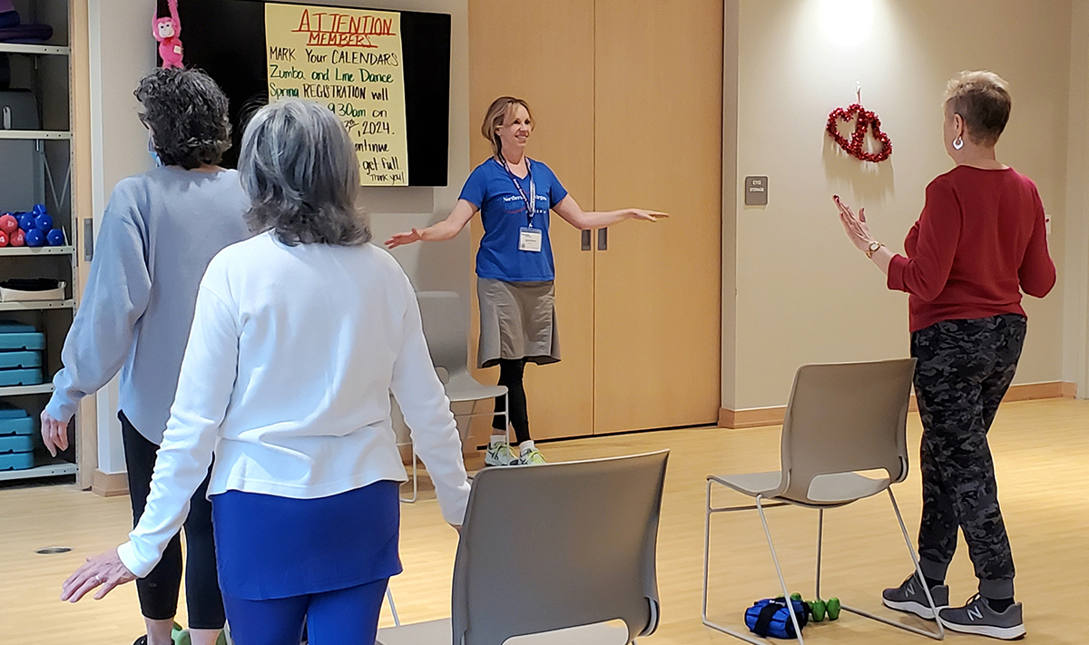 Photo of Julie Brown leading her S.A.I.L. class at Lewinsville Senior Center. 