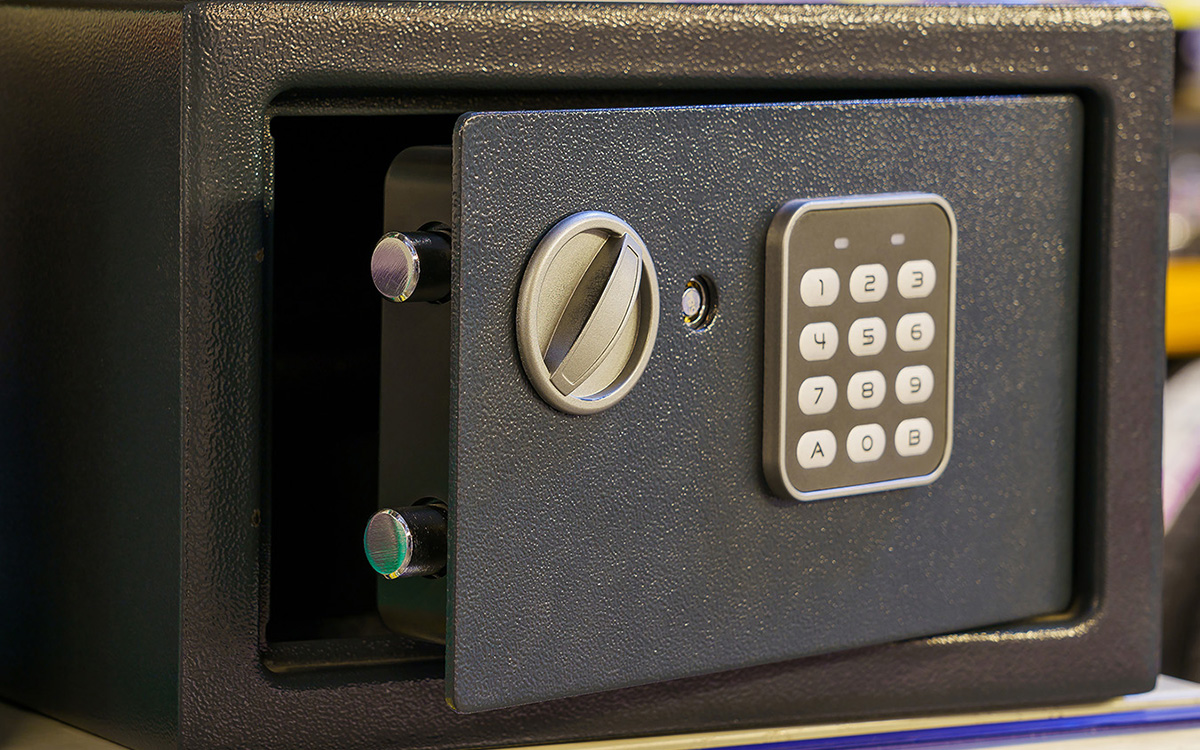 A small safe with a keypad.