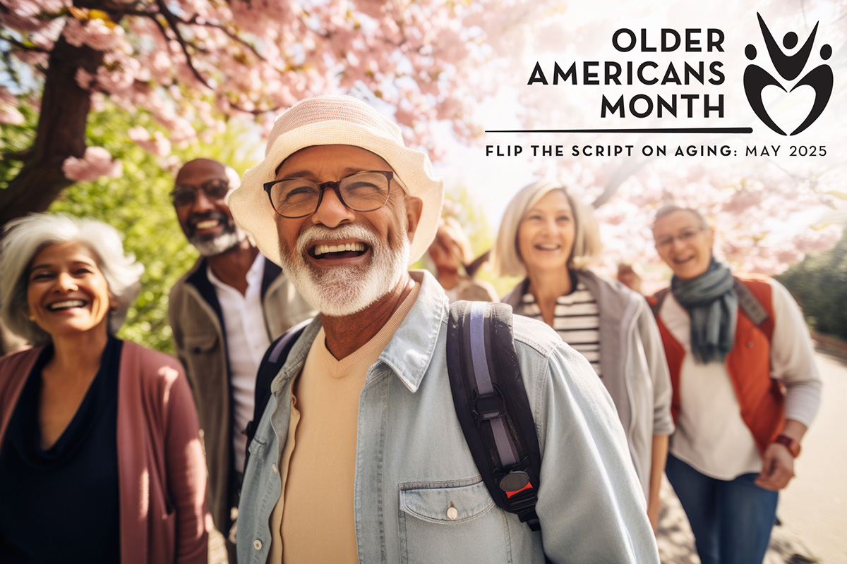 Group of smiling diverse older adults walking together outdoors.