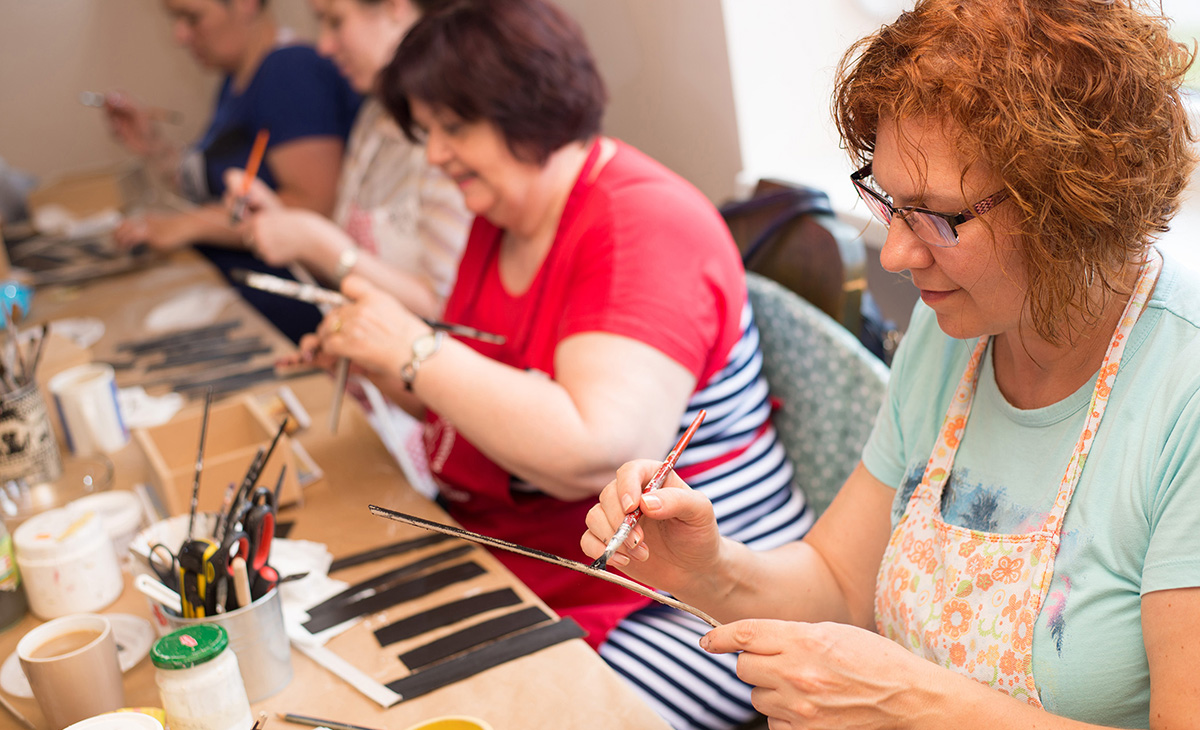 older adults in art class