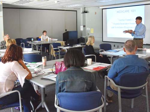 Medicare presentation, eight people in room