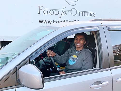 Jamilah Dalton driving vehicle
