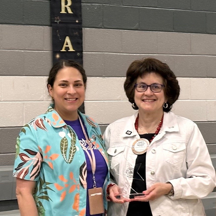 Nadia and Rotary President- partner star