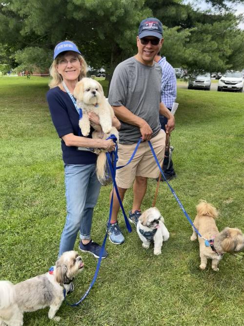 volunteers with small dogs