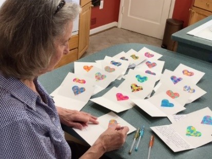 Carol Dexter writing cards