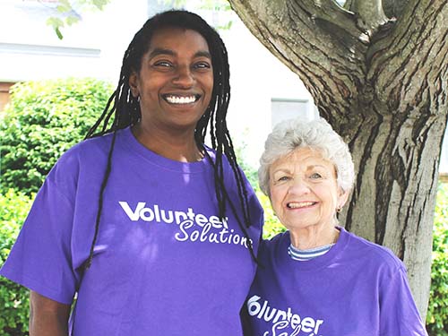 Photo of Two Volunteers