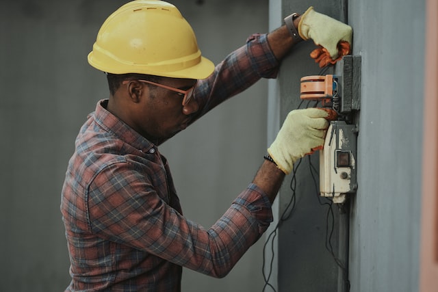 man working on electrical equipment