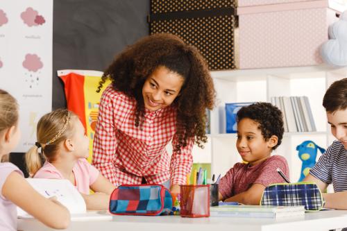 preschool teacher with children
