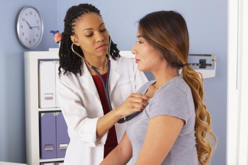 doctor examining patient 