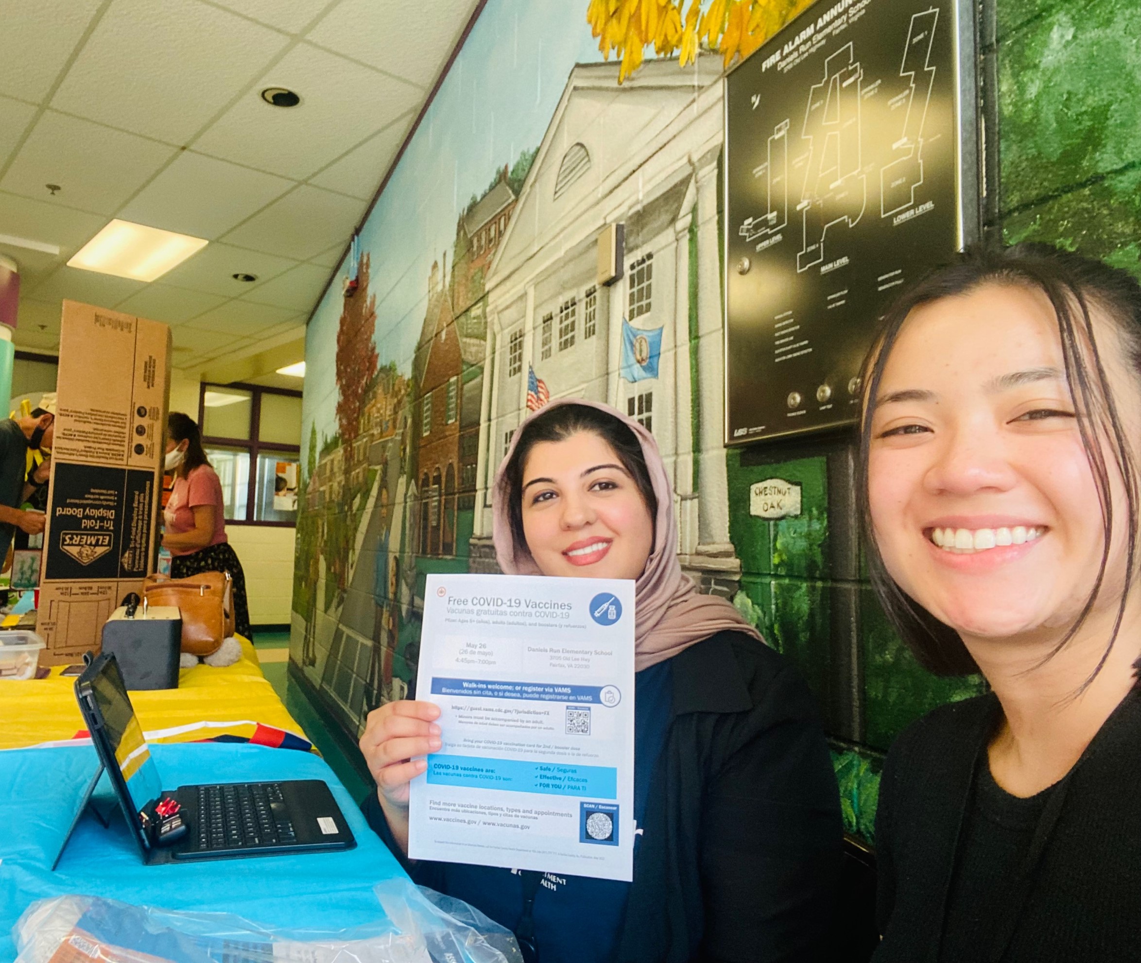 Community health workers at information table
