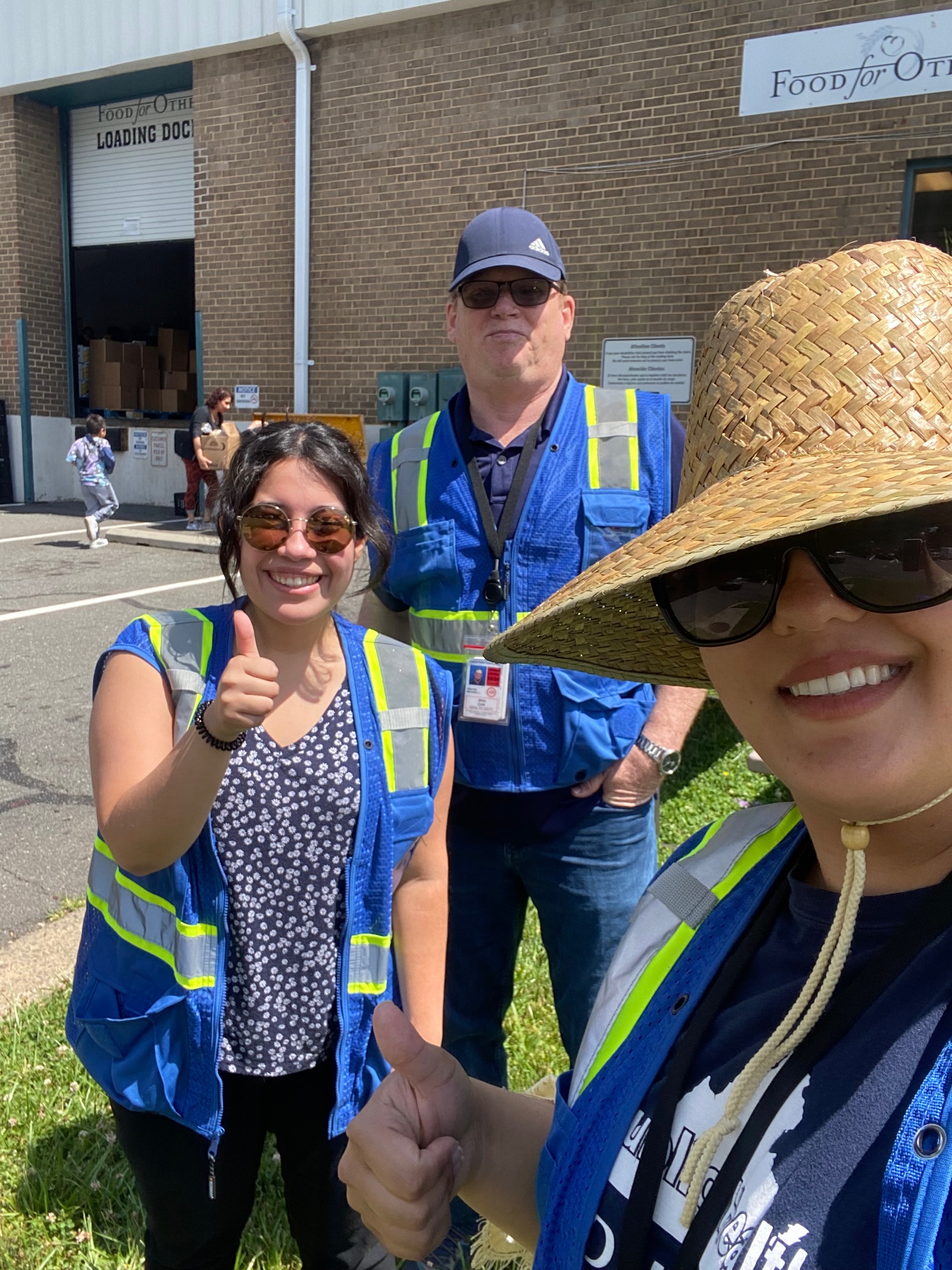 Community health workers assisting at a food distribution event