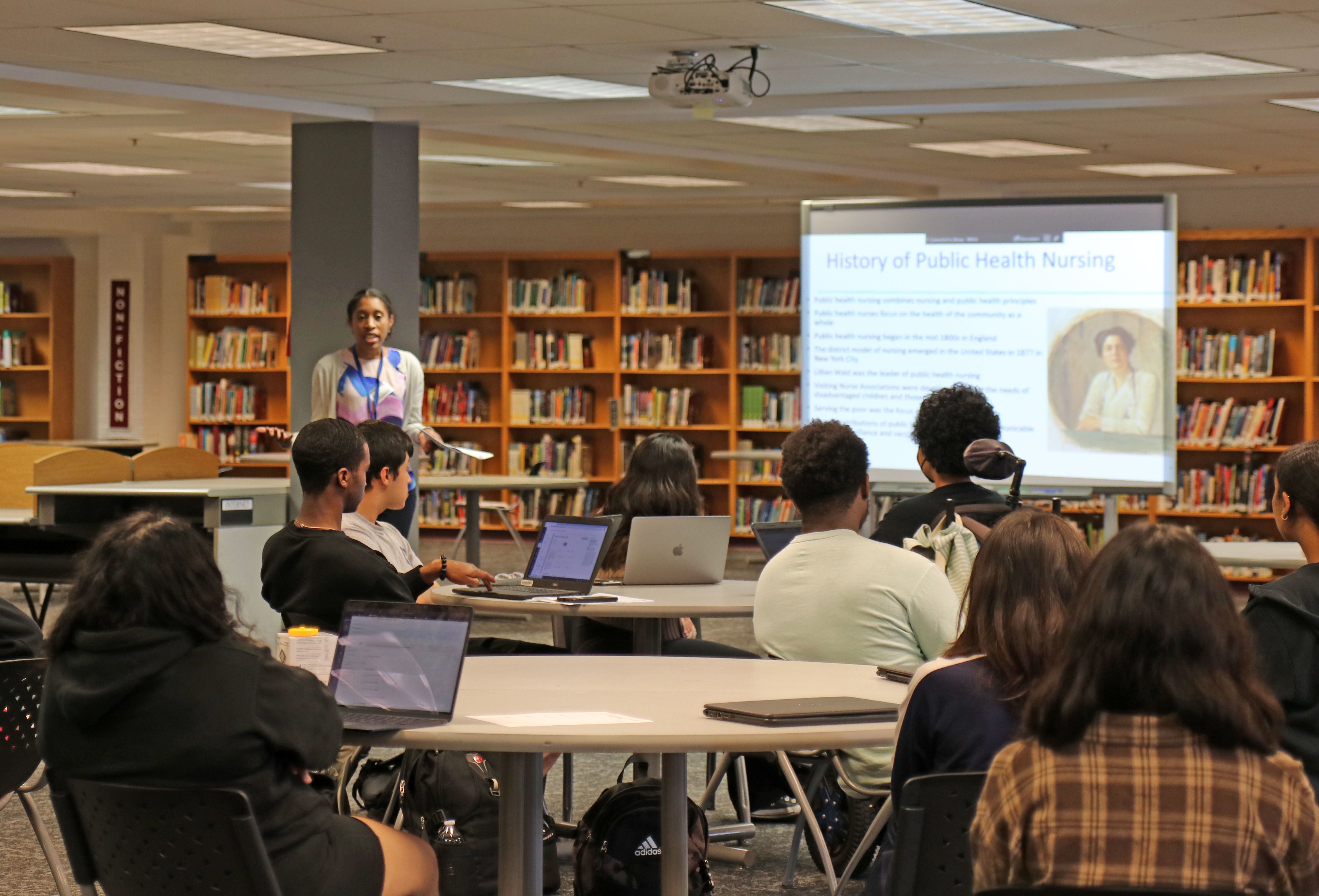 School Health Assistant Division Director, Kimberly Smith presents to the Public Health Youth Ambassadors