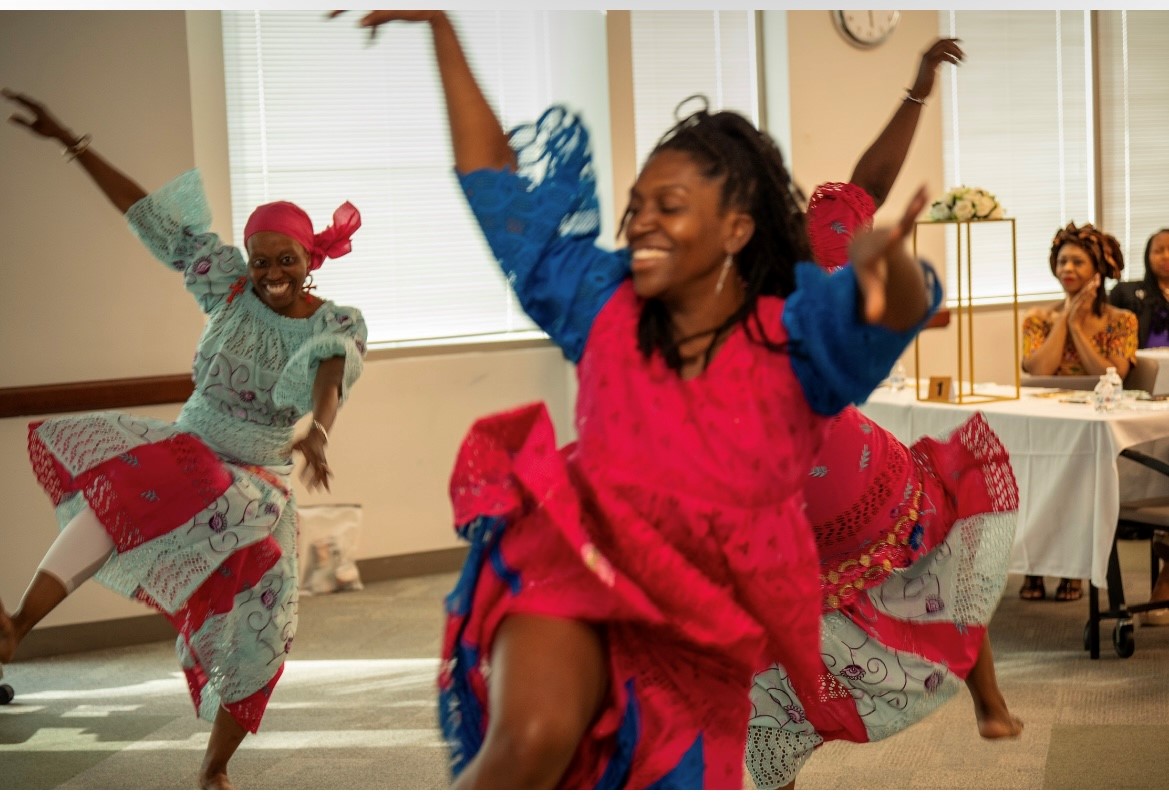 Two people dancing at banquet