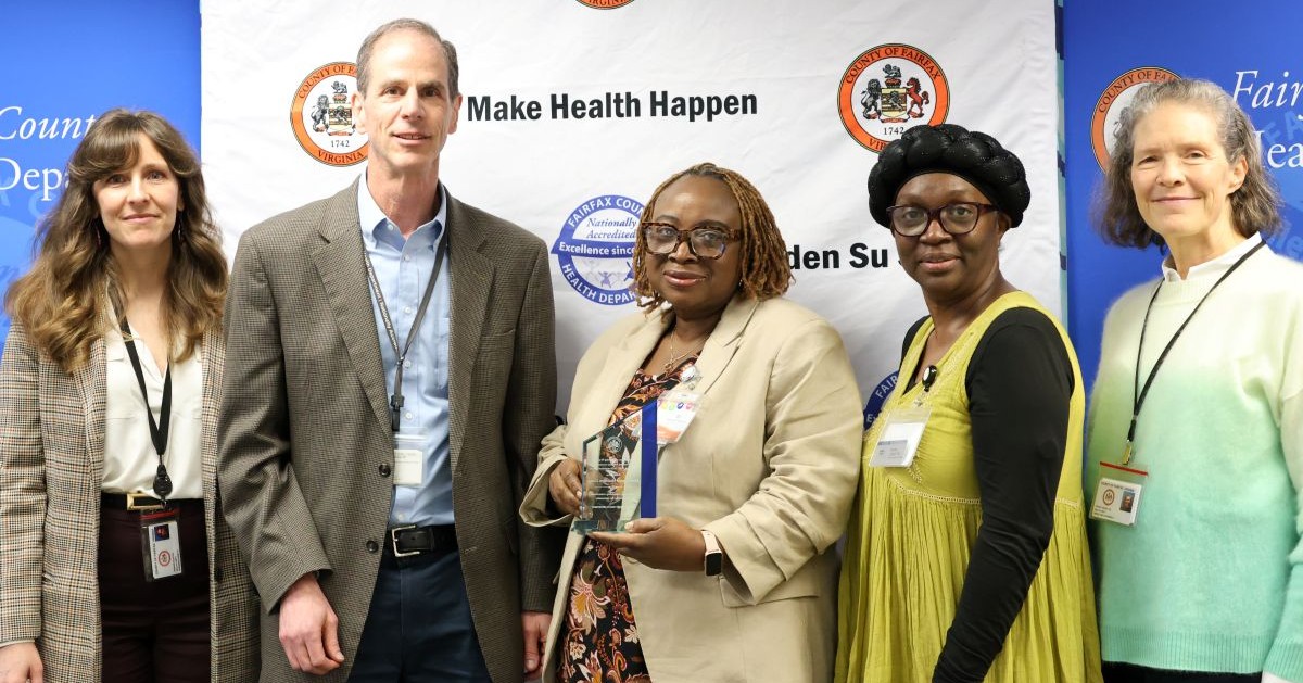 Health Department presenting award to MVCH 