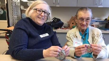 Lincolnia Adult Day Health Care volunteer Maureen Barrett with a participant