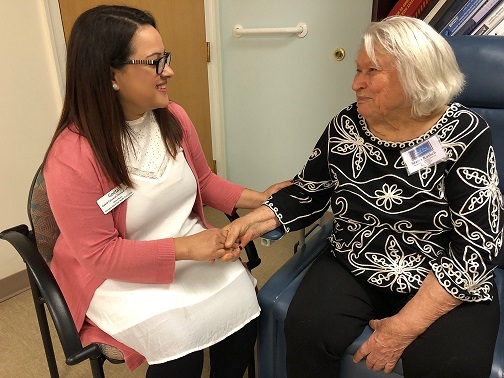 Center nurse Geeta treates a participant