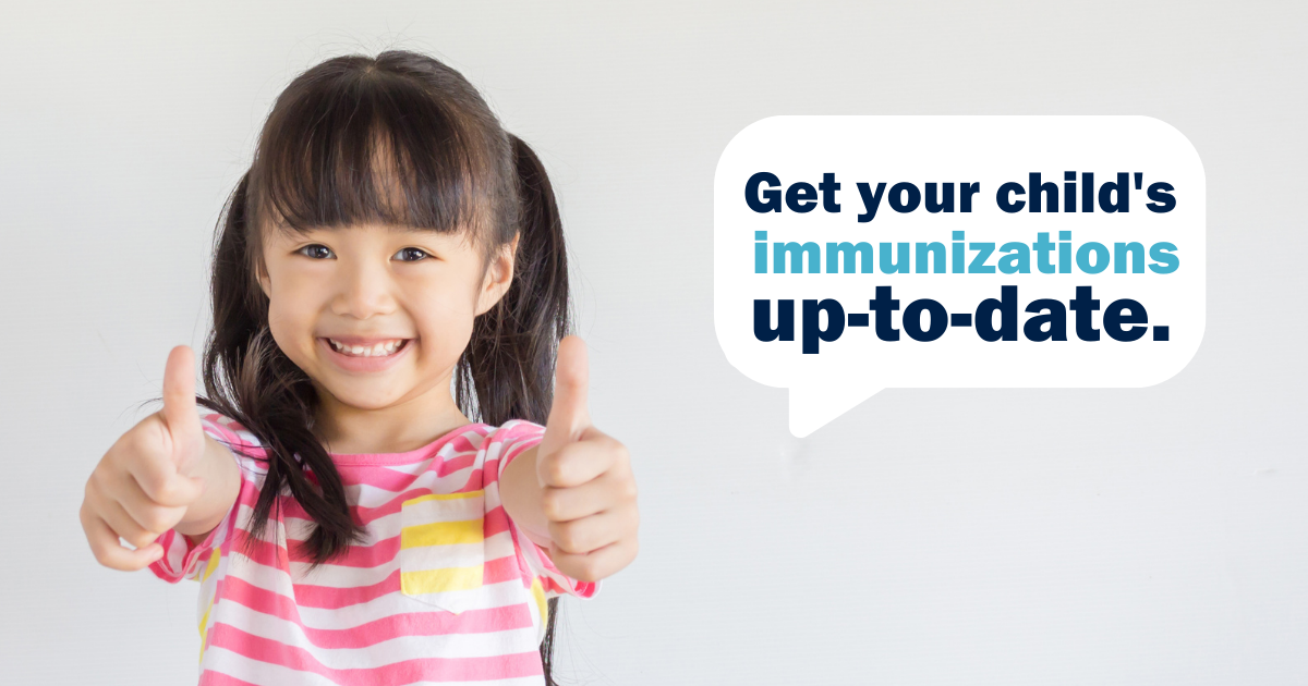 Get your child's immunizations up-to-date. Little girl giving a thumbs up.