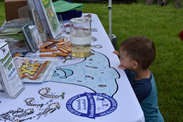 Health Department exhibit booth were attendees learn about disease carrying insects