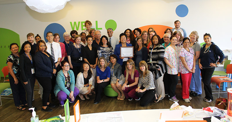 Staff from Fairfax Pediatrics Associates posing with their certificate of recognition