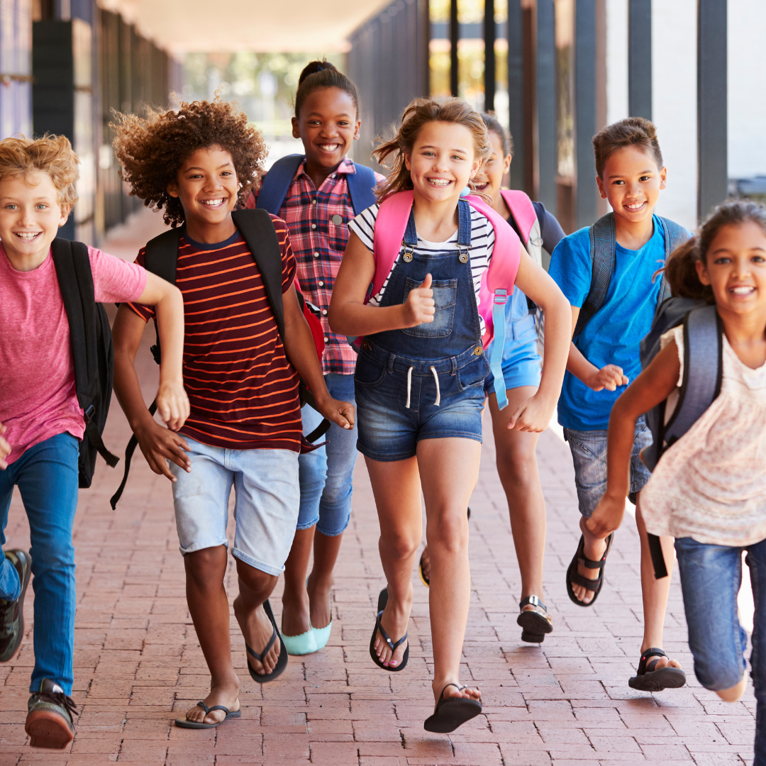 Happy students running