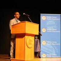 student speaks at a lecturn